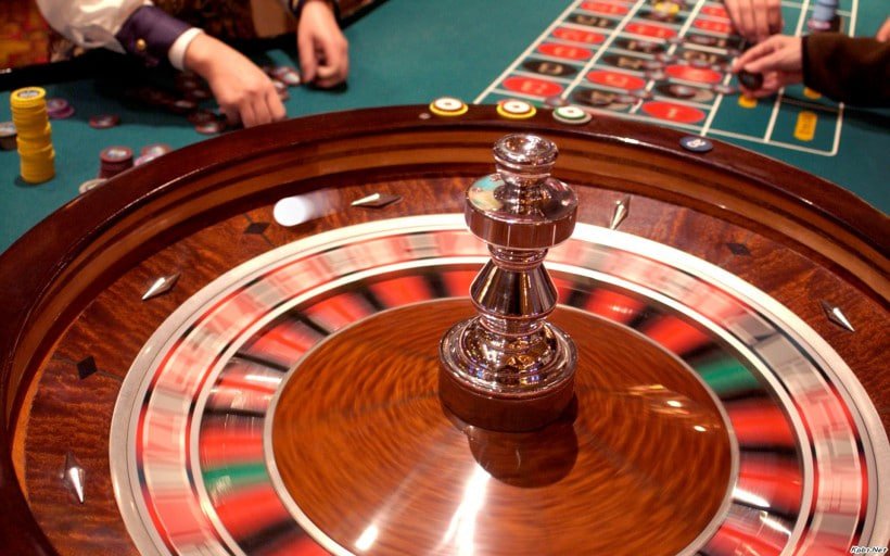 Baccarat table with banker and player bet positions